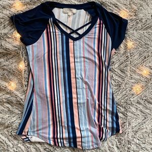 Business casual striped top with cross neck line!
